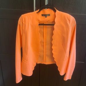Bright orange blazer